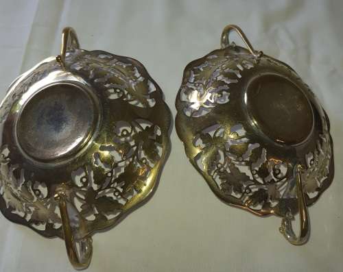 A PAIR OF VINTAGE SILVER SWEETS TRAYS IN RELATIVE GOOD CONDITION SOLD AS IS