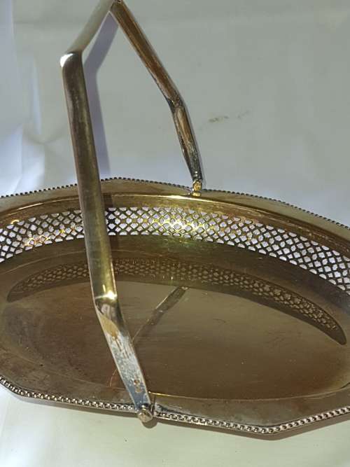 A VINTAGE SERVING TRAY SILVER PLATED SOLD AS IS