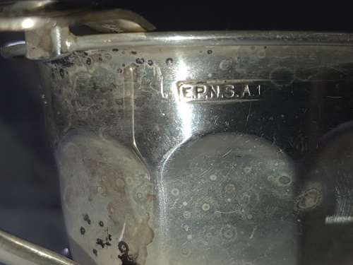 A VINTAGE SILVER PLATED SAUCE BOAT AND LADEL SOLD AS IS