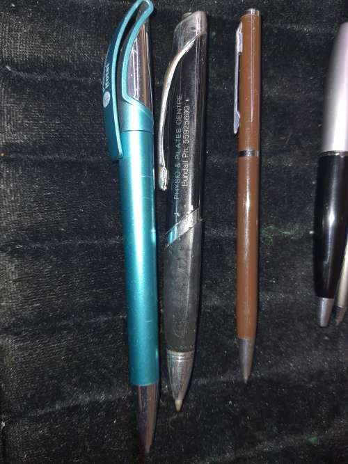 A COLLECTION JOBLOT ROLLER BALL PENS AND PENCILS SOLD AS IS NOT TESTED