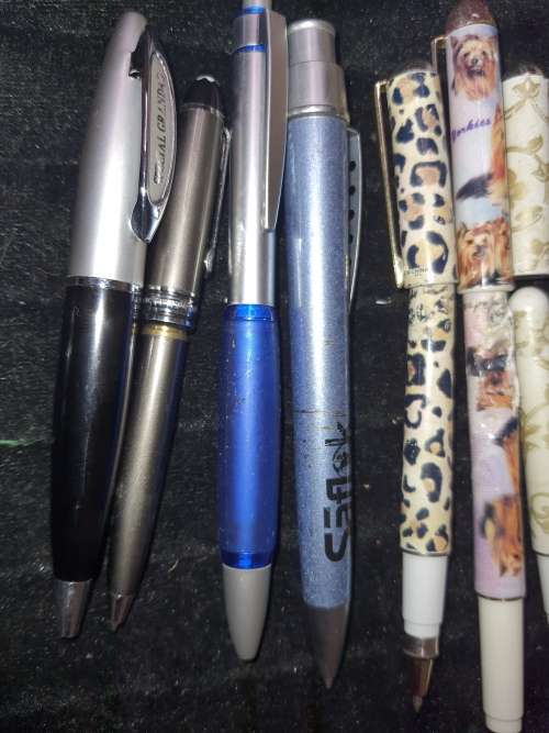 A COLLECTION JOBLOT ROLLER BALL PENS AND PENCILS SOLD AS IS NOT TESTED