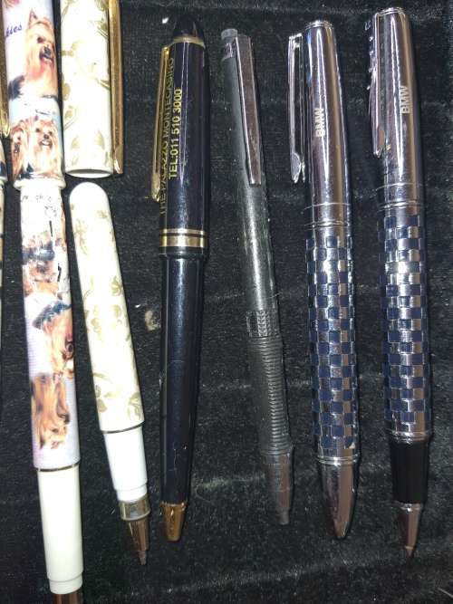 A COLLECTION JOBLOT ROLLER BALL PENS AND PENCILS SOLD AS IS NOT TESTED