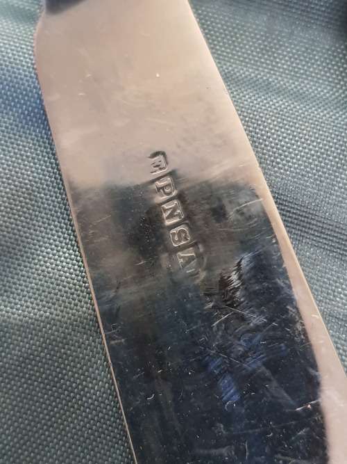 A VINTAGE FISH KNIFE AND FORK SET WITH BONE TYPE HANDES  EPNS AI STILL IN ITS ORIGINAL PADDED BOX S