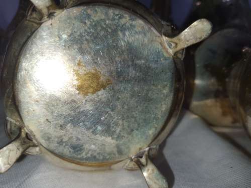 A VINTAGE EPNS ORNATE TEA SET SOLD AS IS