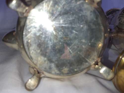 A VINTAGE EPNS ORNATE TEA SET SOLD AS IS
