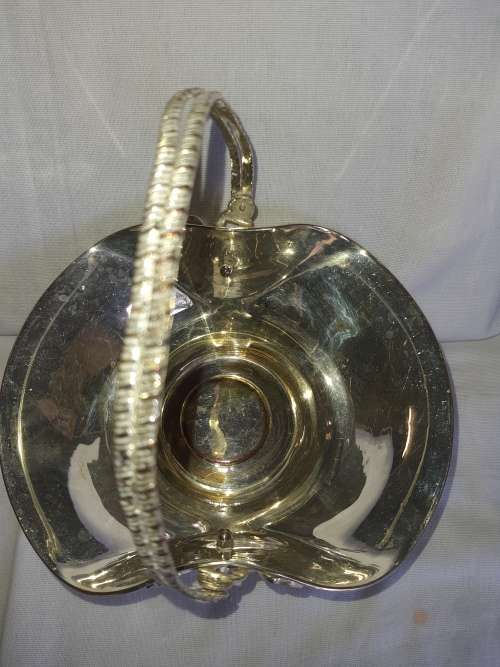 A VINTAGE SILVER PLATED SERVING TRAY BASKET SOLD AS IS