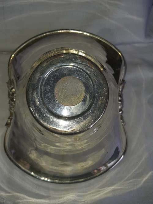 A VINTAGE SILVER PLATED SERVING TRAY BASKET SOLD AS IS