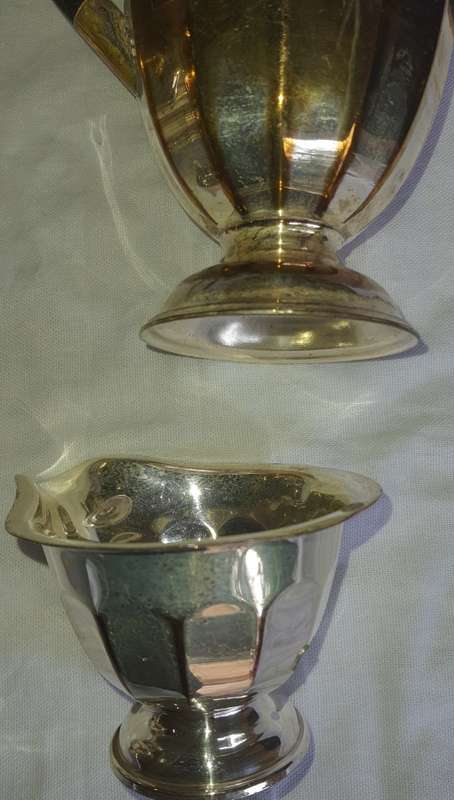 A VINTAGE EPNS SILVER PLATED TEA SET SOLD AS IS
