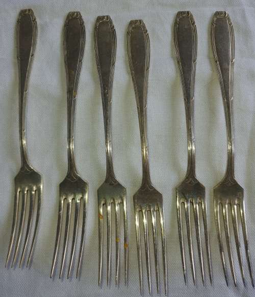 A VINTAGE SET OF SIVER PLATED FORKS EPNS SOLD AS IS