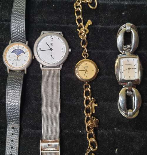A COLLECTION OF VINTAGE WOMANS QUARTZ WATCHES SOLD AS IS NOT TESTED