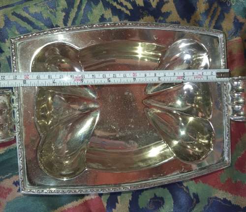 AN ORNATE SIVER PLATED SWEATS BOWL IN GOOD CONDITION SOLD AS IS