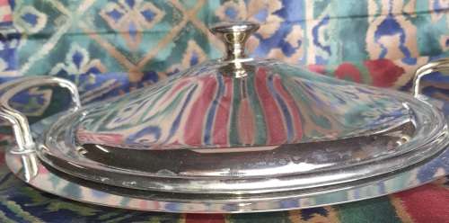 A VINTAGE STAINLESS STEEL WITH GOLD TONE HANDLES WARMER