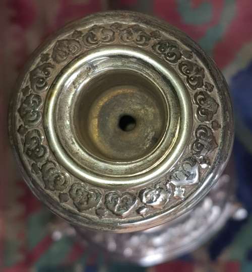 TWO VINTAGE EPNS OR SILVER PLATED VASE AND A ORNATE CANDLE STAND SOLD AS IS