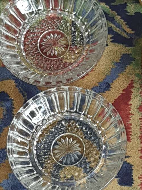 A COLLECTION OF CANOP`E PPRCELLAIN AND GLASS PLATES SOLD AS IS