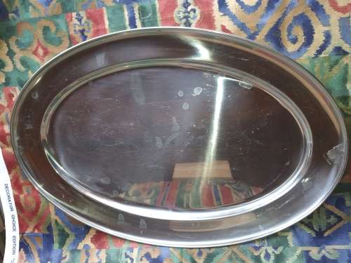 AN EXTRA LARGE STAINLESS STEEL OVAL SERVING TRAY