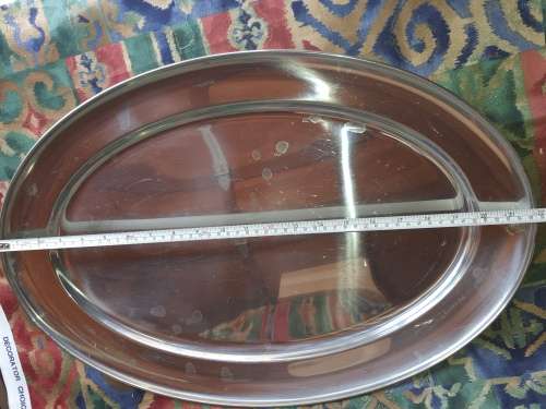 AN EXTRA LARGE STAINLESS STEEL OVAL SERVING TRAY