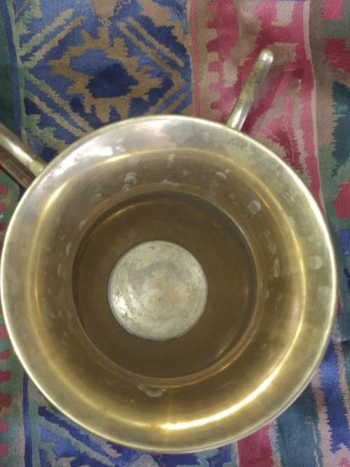 A VINTAGE BRONZES BOUBLE HANDLED WATER OR BEER JUG