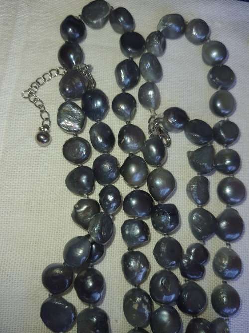 A COLLECTION OF GENUINE NATURAL  PEARL NECKLACES SOLD AS IS