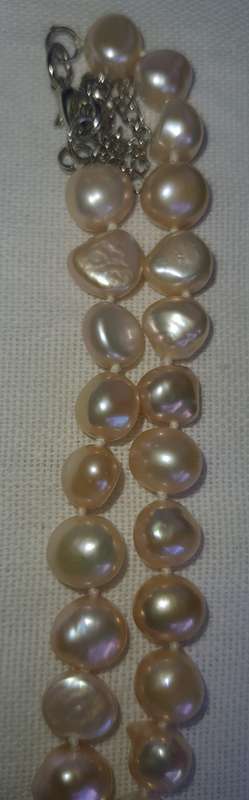 A COLLECTION OF GENUINE NATURAL  PEARL NECKLACES SOLD AS IS
