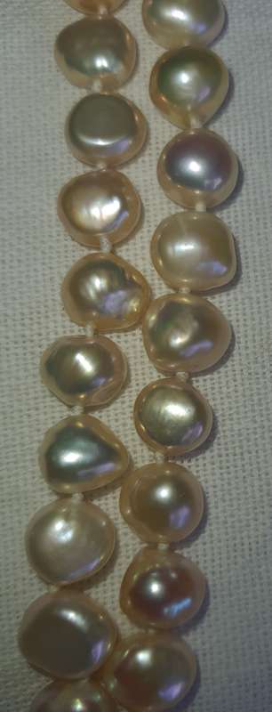 A COLLECTION OF GENUINE NATURAL  PEARL NECKLACES SOLD AS IS
