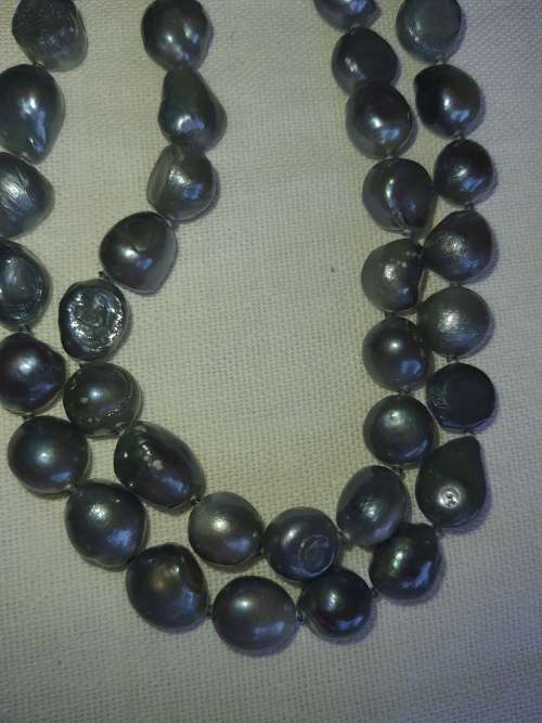 A COLLECTION OF GENUINE NATURAL  PEARL NECKLACES SOLD AS IS