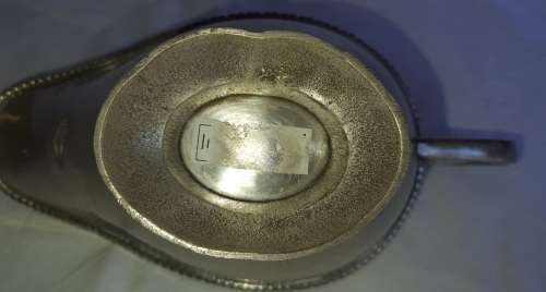 A VINTAGE ALUMINIUM ALLOY SAUCE JUG IN GOOD CONDITION SOLD AS IS