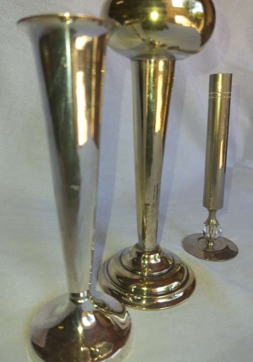 3 SILVER PLATED VASES IN GOOD CONDITION SOLD AS IS