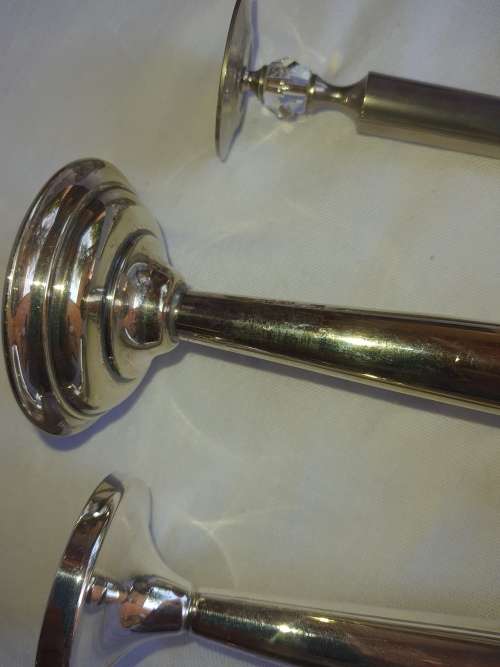 3 SILVER PLATED VASES IN GOOD CONDITION SOLD AS IS