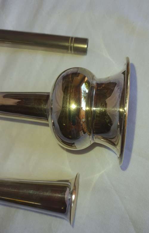 3 SILVER PLATED VASES IN GOOD CONDITION SOLD AS IS
