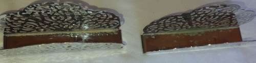 TWO STAINLESS STEEL ORNATE DESIGNED SERVIETTE HOLDERS IN MINT CONDITION SOLD AS IS