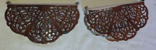 TWO STAINLESS STEEL ORNATE DESIGNED SERVIETTE HOLDERS IN MINT CONDITION SOLD AS IS