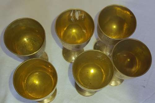 A VINTAGE SET OF 6 SHERRY GOBLETS  SILVER PLATED ON BRONZE SOLD AS IS