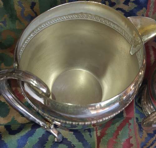 A SET OF TWO VINTAGE SILVER PLATED ROMAN STYLE JUGS