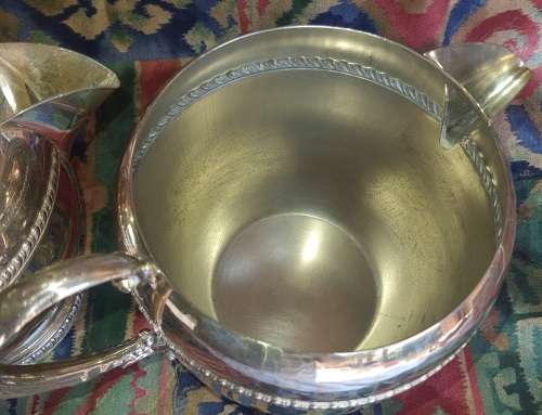 A SET OF TWO VINTAGE SILVER PLATED ROMAN STYLE JUGS