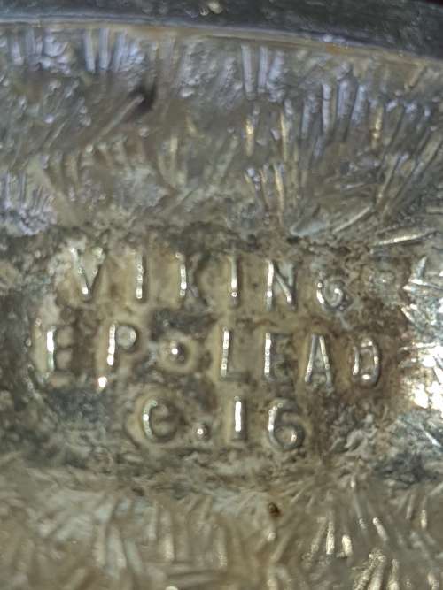 A SET OF ANTIQUE SALT AND PEPPER DISPENSORS STAMPED EP ON LEAD E.16 SOLD AS IS