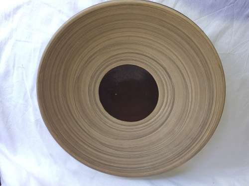 A VINTAGE  KILN BAKED CLAY SERVING BOWL IN MINT CONDITION SOLD AS IS
