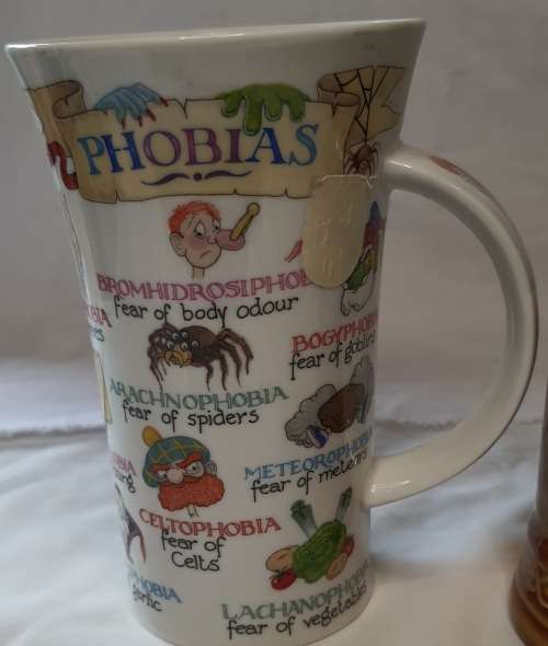 TWO COLLECTORS CERAMIC BEER MUGS SOLD AS IS