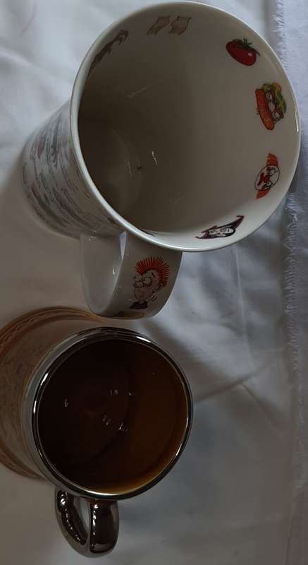 TWO COLLECTORS CERAMIC BEER MUGS SOLD AS IS