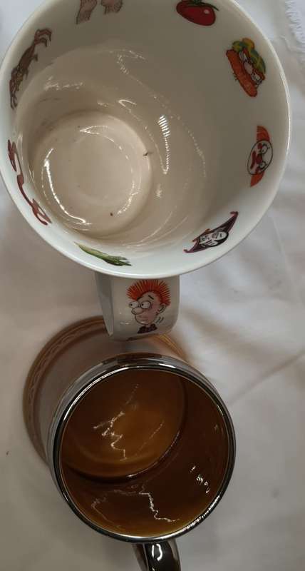 TWO COLLECTORS CERAMIC BEER MUGS SOLD AS IS