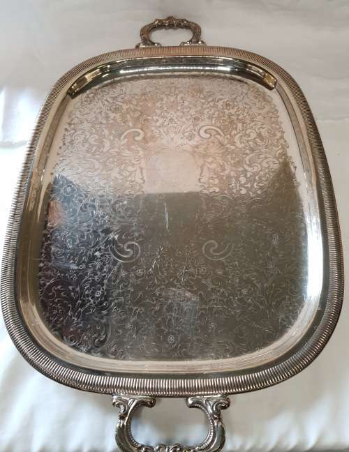 AN EXTRA LARGE VINTAGE SILVER PLATED SERVING TRAY WITH A PAISELEY PATERN 22 INCHES BY 14 INCHES