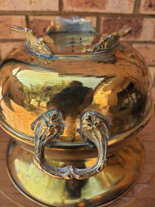 A VINTAGE ROMAN STYLE POT PLANTER OR VASE