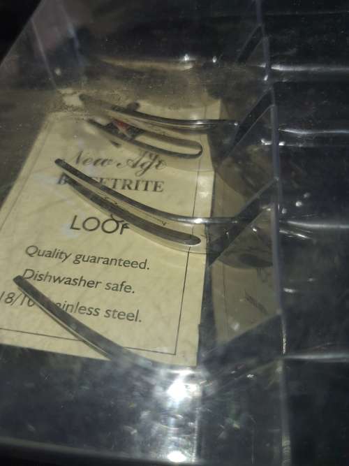 A SET OF LOOP EETRITE COCKTAIL FORKS
