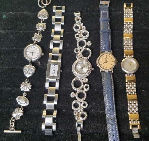 A COLLECTION OF WOMANS DRESS WATCHES SOLD AS IS NOT TESTED