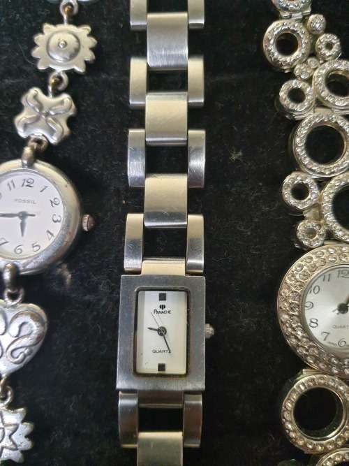 A COLLECTION OF WOMANS DRESS WATCHES SOLD AS IS NOT TESTED