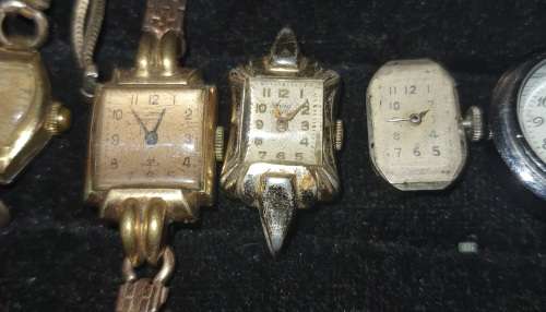 A COLLECTION OF ANTIQUE WOMANS WATCHES SOLD AS IS NOT TESTED