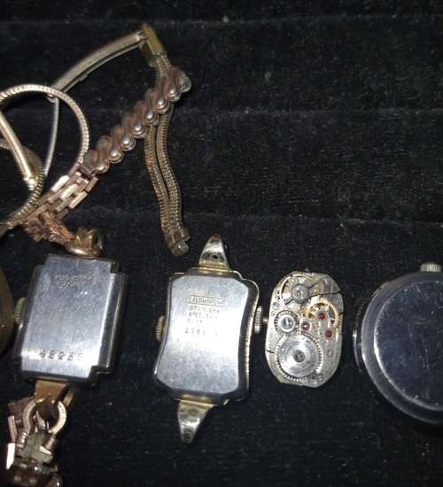 A COLLECTION OF ANTIQUE WOMANS WATCHES SOLD AS IS NOT TESTED