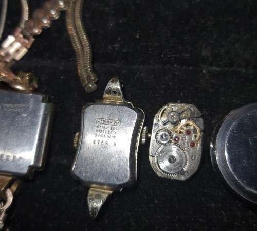 A COLLECTION OF ANTIQUE WOMANS WATCHES SOLD AS IS NOT TESTED