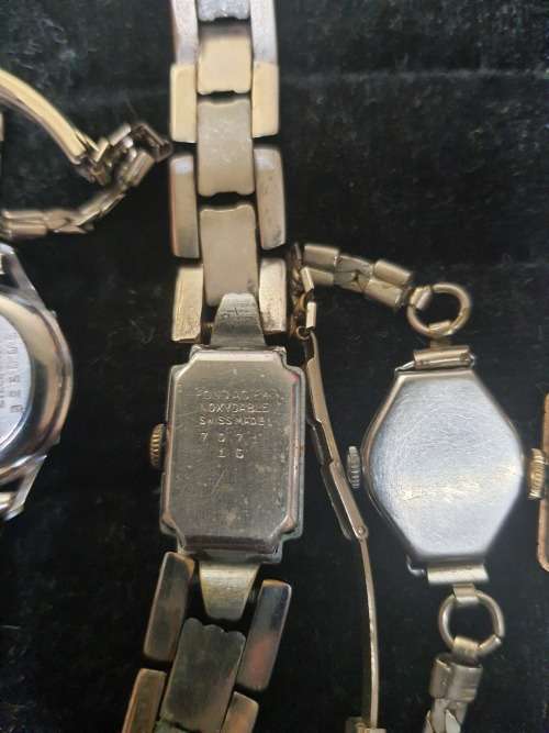 A COLLECTION OF VINTAGE AND ANTIQUE WOMANS WATCHES SOLD AS IS NOT TESTED [ E1]