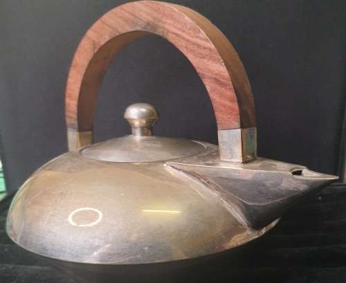 AN ART DECOR VINTAGE TEA SET WITH WOODEN HANDLES