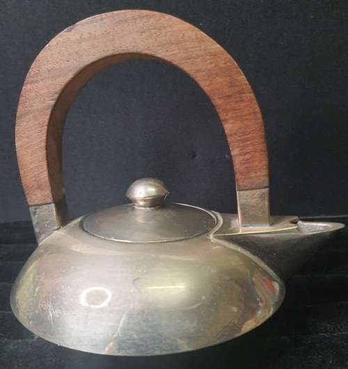 AN ART DECOR VINTAGE TEA SET WITH WOODEN HANDLES